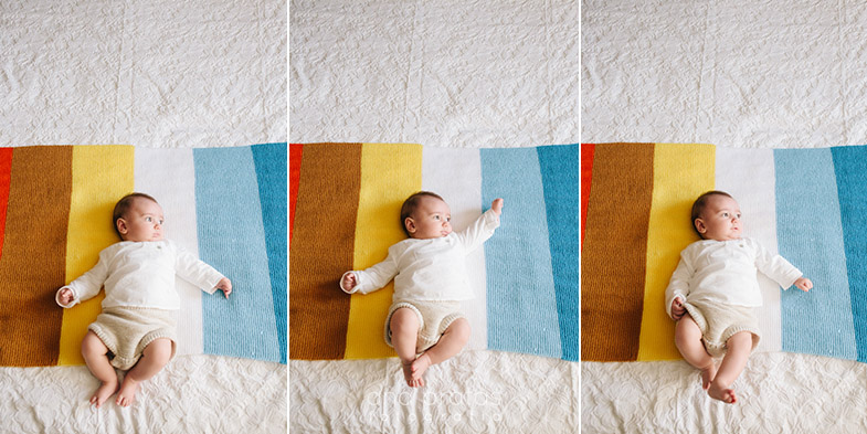 17 Bebé com manta colorida